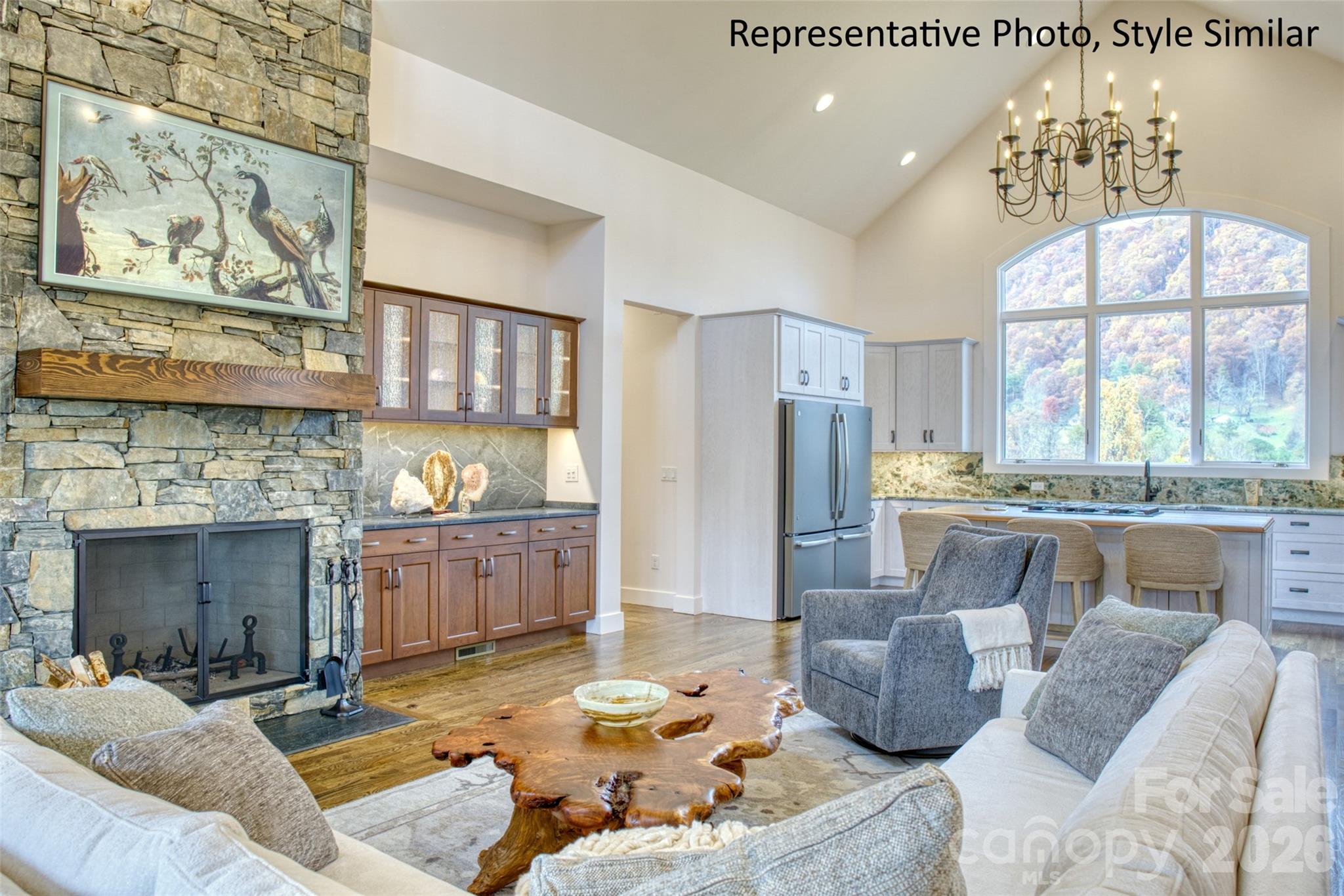 301 Awohali Trail Maggie Valley, NC 28751 - Photo 6 of 31 a living room with fireplace furniture and a large window