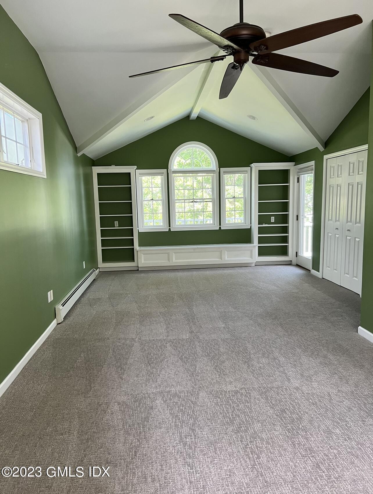 5 Tory Road Riverside, CT 06878 - Photo 16 of 26 a view of an empty room with a fireplace and a window
