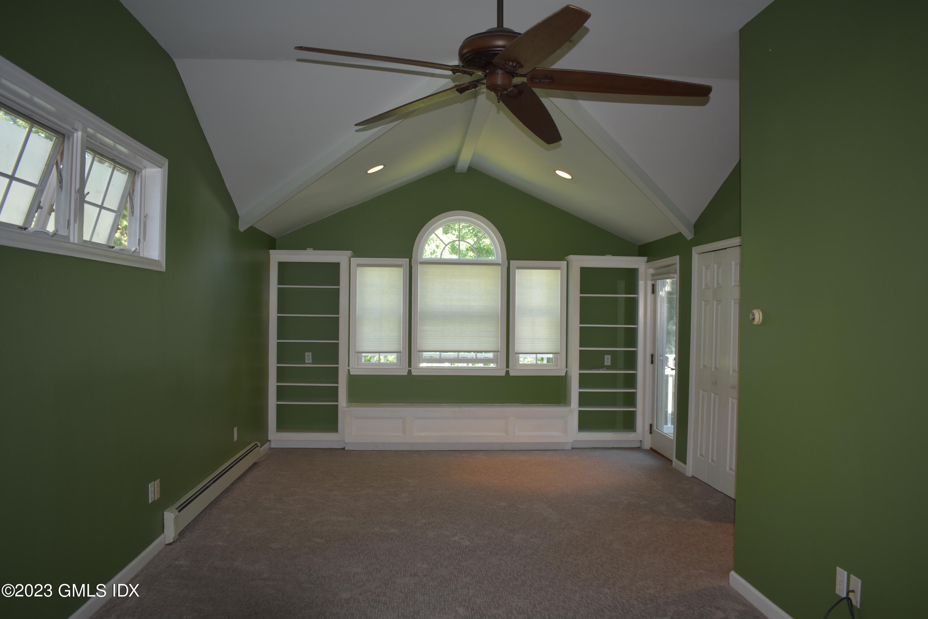 5 Tory Road Riverside, CT 06878 - Photo 17 of 26 a view of a livingroom with a ceiling fan and window