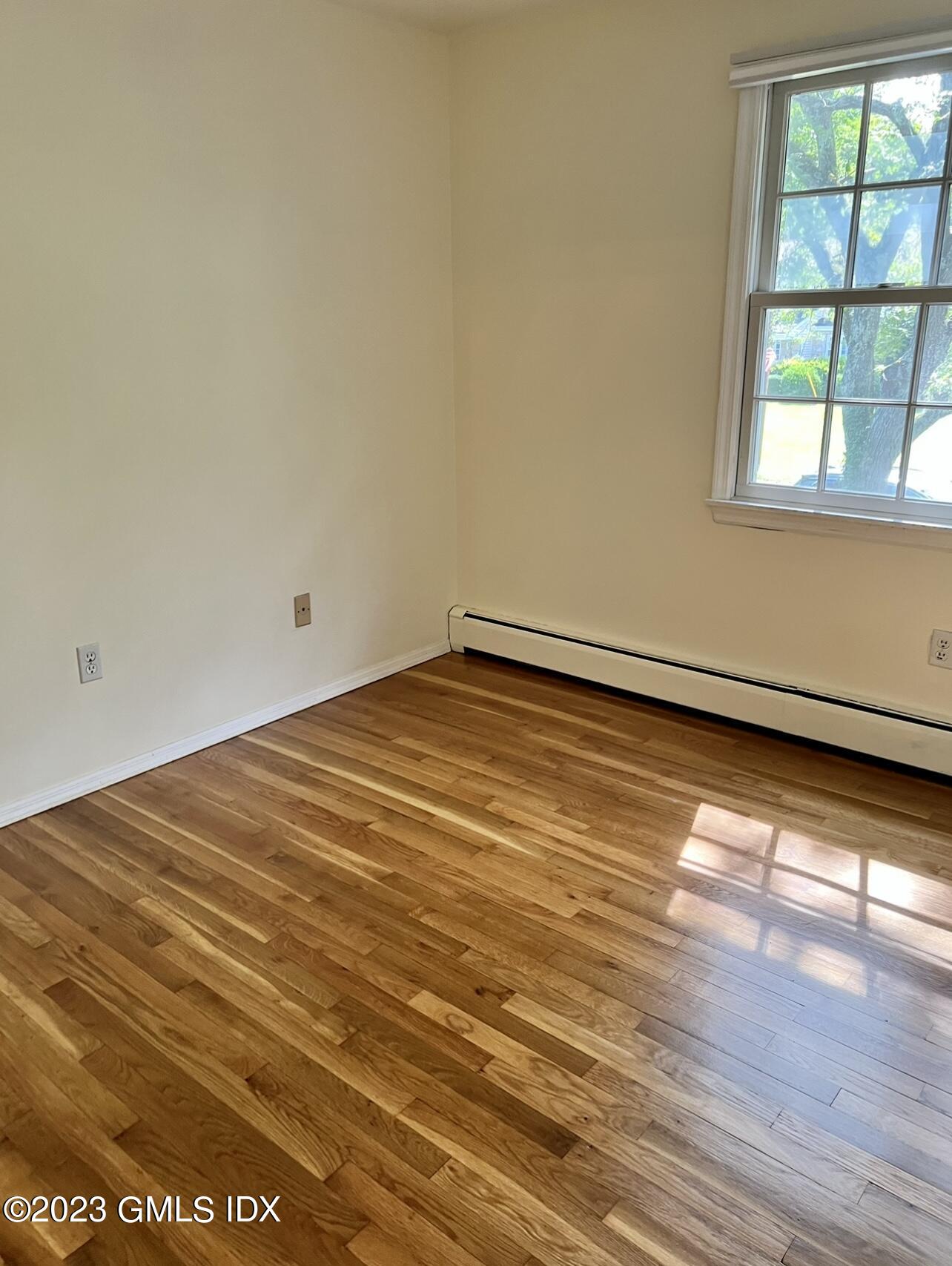 5 Tory Road Riverside, CT 06878 - Photo 20 of 26 a view of empty room with wooden floor and fan