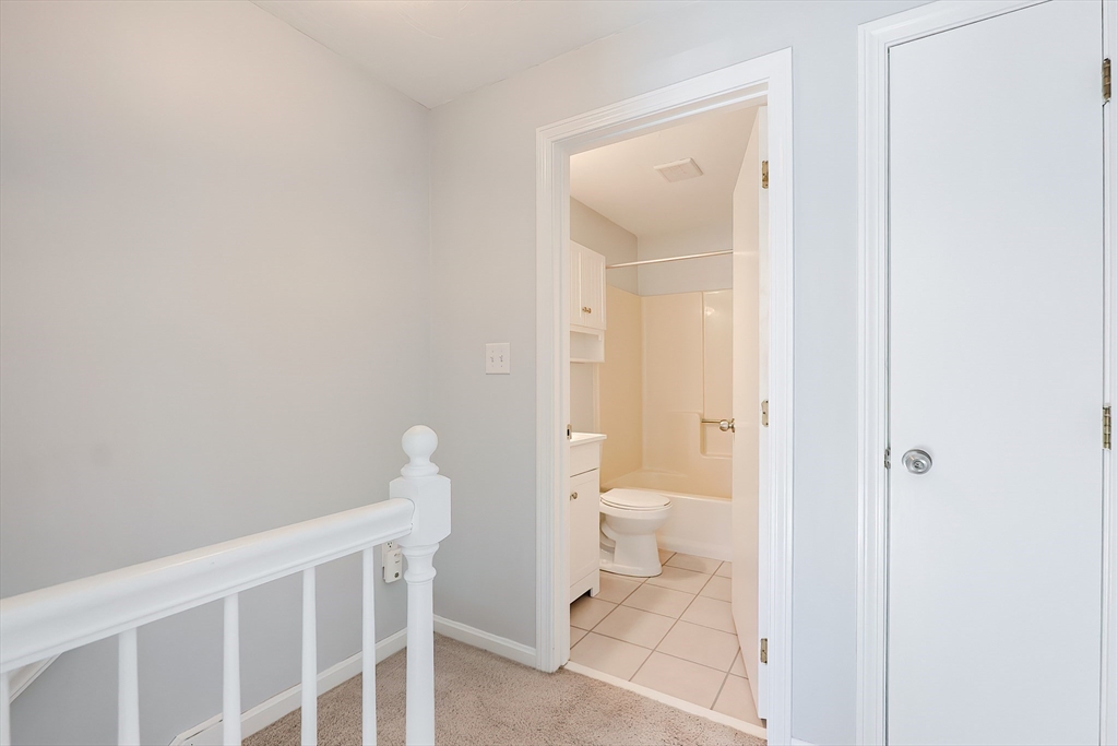 131 Harkness Road, Unit B Millville, MA 01529 - Photo 31 of 41 a bathroom with a toilet and a sink