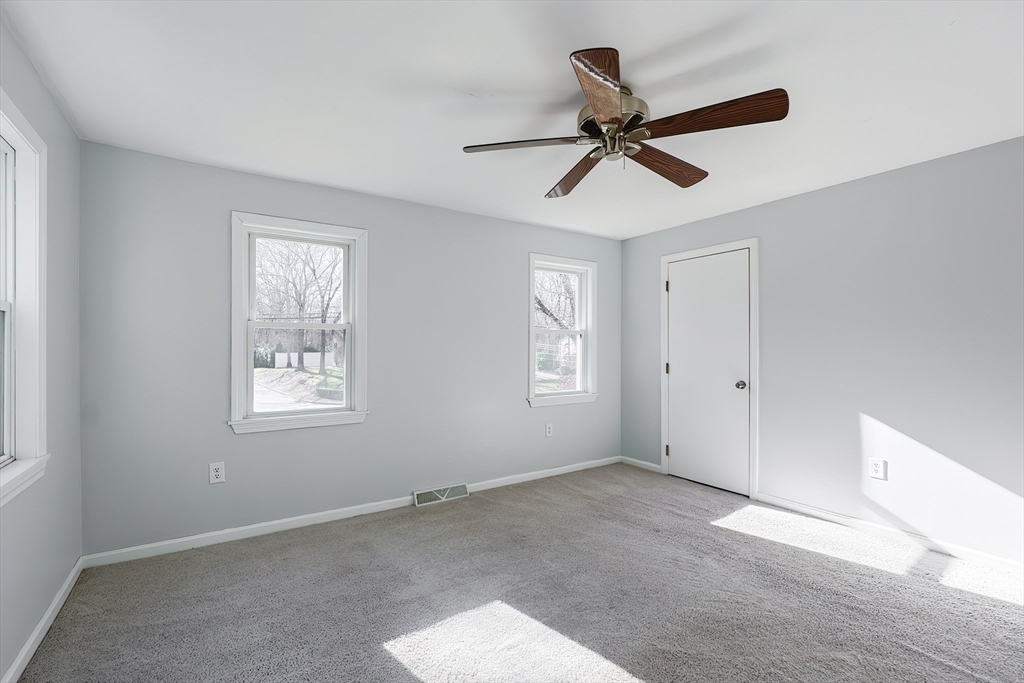 131 Harkness Road, Unit B Millville, MA 01529 - Photo 38 of 41 a view of room with ceiling fan and window