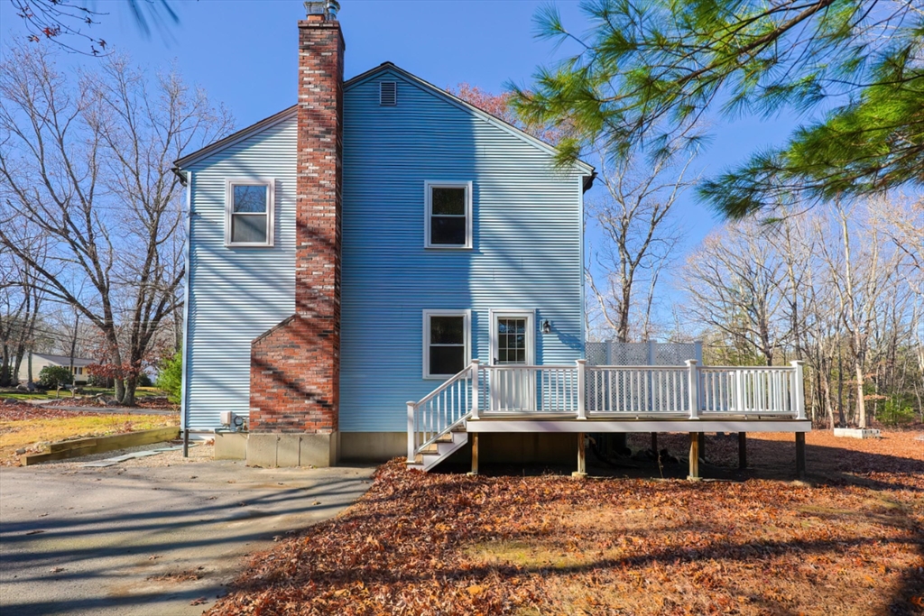 131 Harkness Road, Unit B Millville, MA 01529 - Photo 6 of 41 a house view with a outdoor space