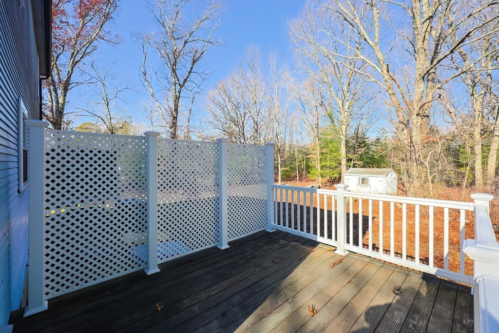 131 Harkness Road, Unit B Millville, MA 01529 - Photo 8 of 41 a view of a gate with wooden fence