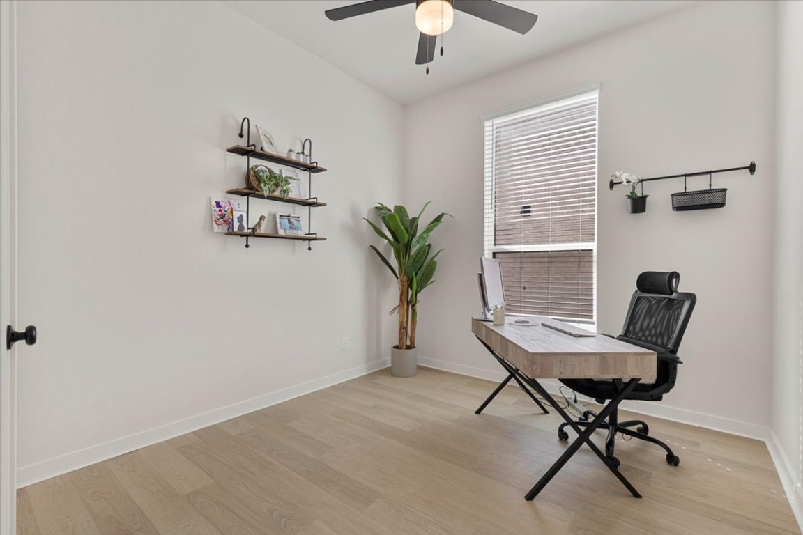 1020 Highcrest Georgetown, TX 78628 - Photo 20 of 39 a view of a workspace with furniture and a window