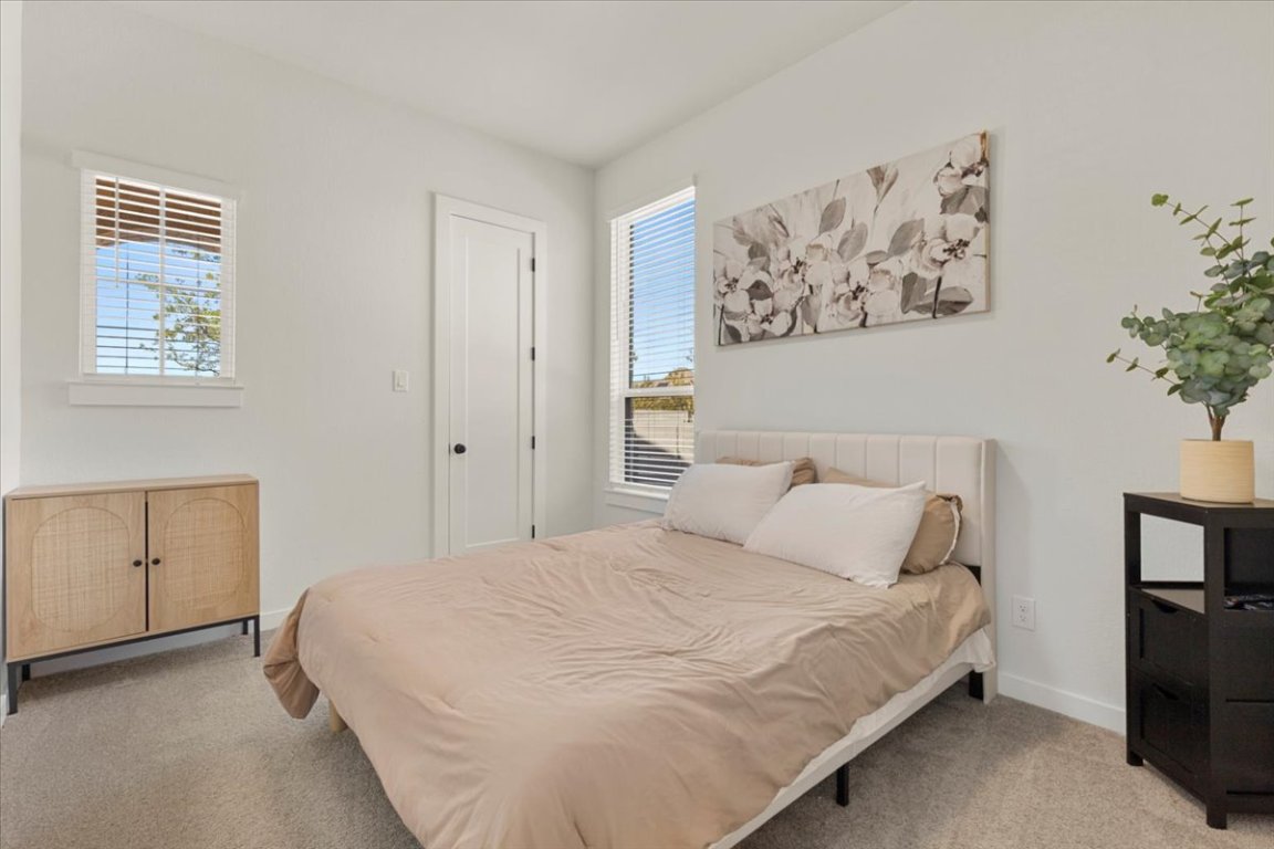 1020 Highcrest Georgetown, TX 78628 - Photo 21 of 39 a bedroom with a bed and painting on the wall