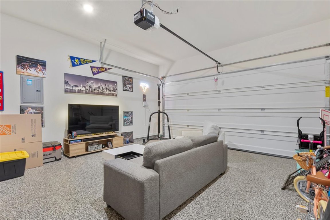 1020 Highcrest Georgetown, TX 78628 - Photo 27 of 39 a living room with furniture and a flat screen tv