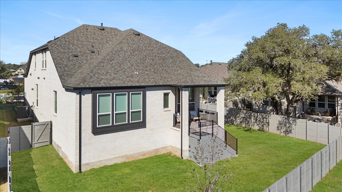 1020 Highcrest Georgetown, TX 78628 - Photo 33 of 39 a view of a house with backyard and porch