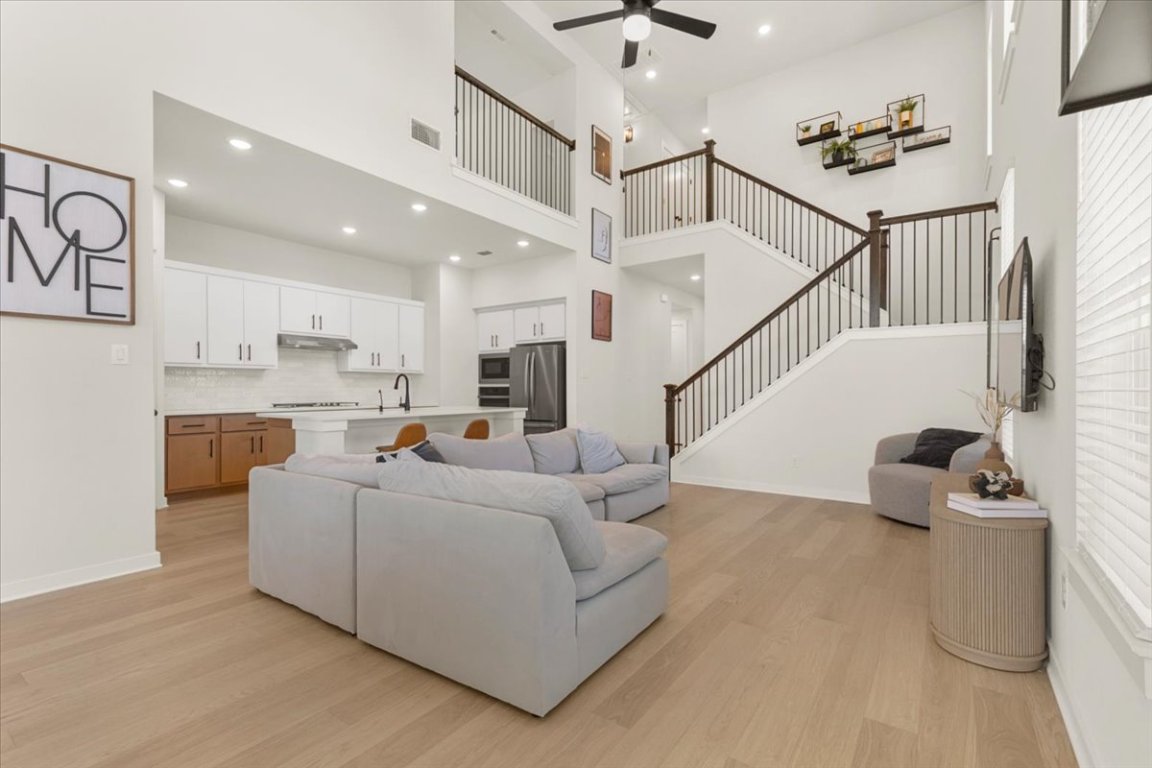 1020 Highcrest Georgetown, TX 78628 - Photo 6 of 39 a living room with furniture and wooden floor