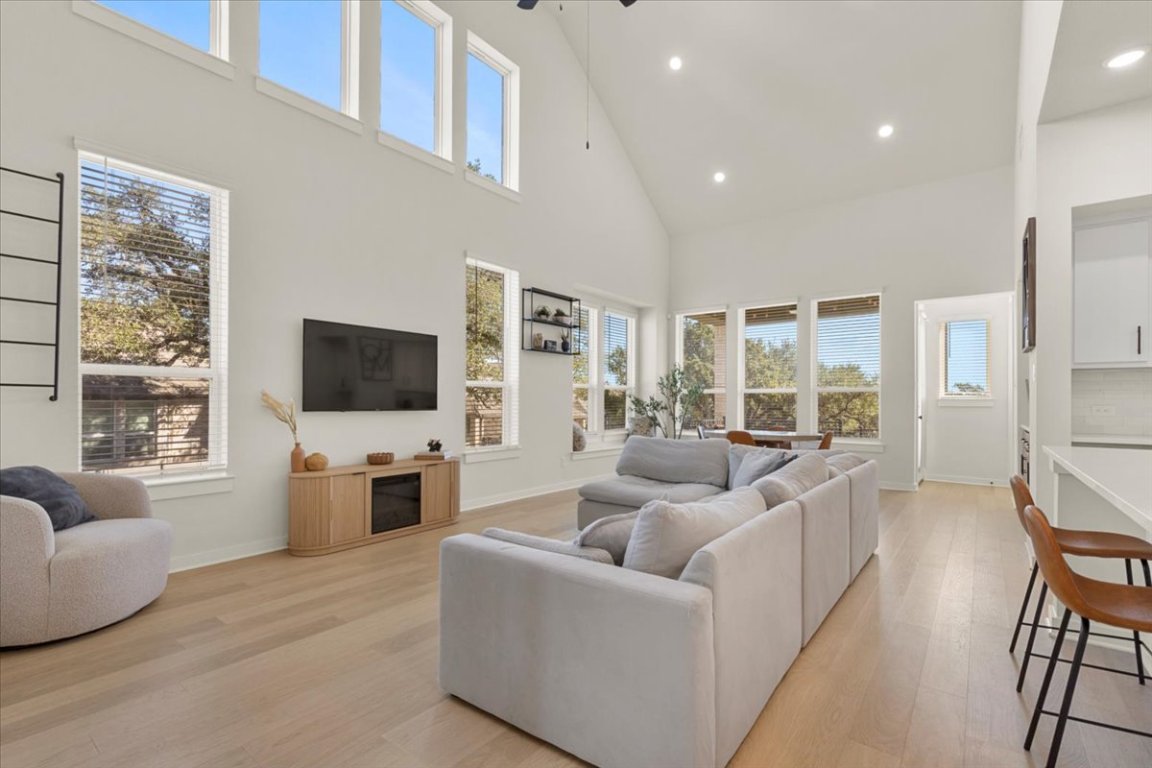 1020 Highcrest Georgetown, TX 78628 - Photo 7 of 39 a living room with furniture and a flat screen tv