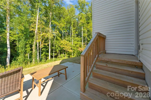 a balcony with chairs