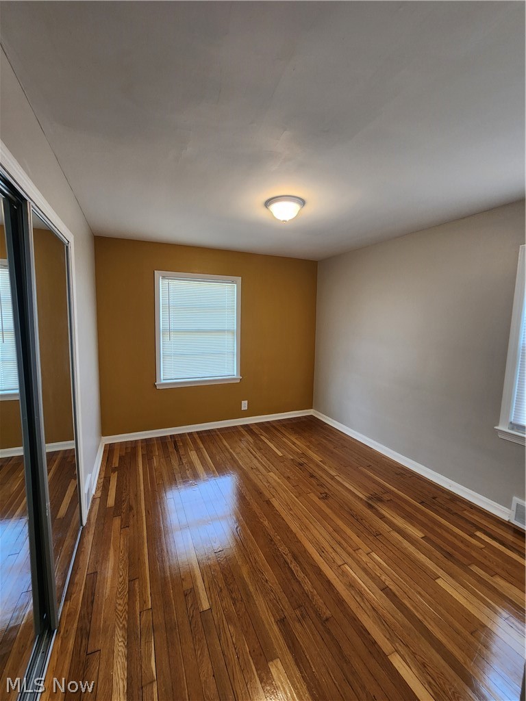 2199 North Taylor Road Cleveland Heights, OH 44112 - Photo 13 of 19 Empty room with dark hardwood / wood-style flooring