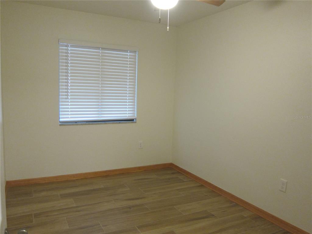 7023 Southwest 21st Lane Gainesville, FL 32607 - Photo 20 of 27 a view of a room that has a window in it