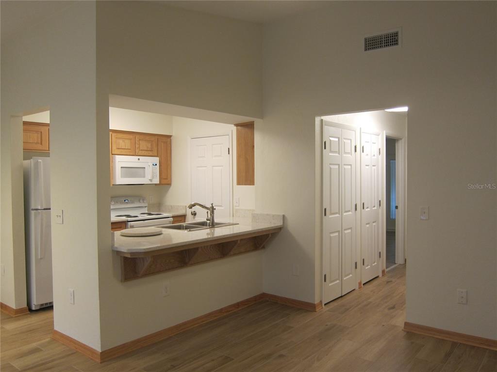 7023 Southwest 21st Lane Gainesville, FL 32607 - Photo 2 of 27 a kitchen with sink and cabinets