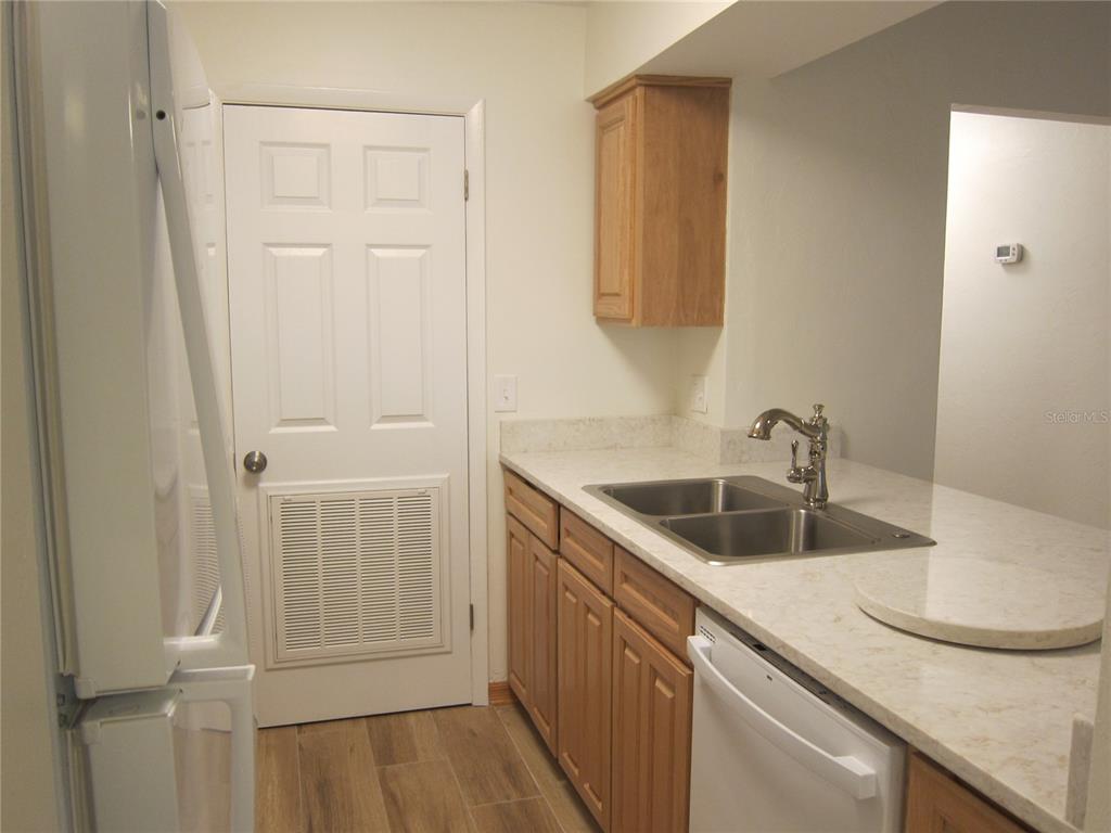 7023 Southwest 21st Lane Gainesville, FL 32607 - Photo 5 of 27 a bathroom with a sink and a mirror