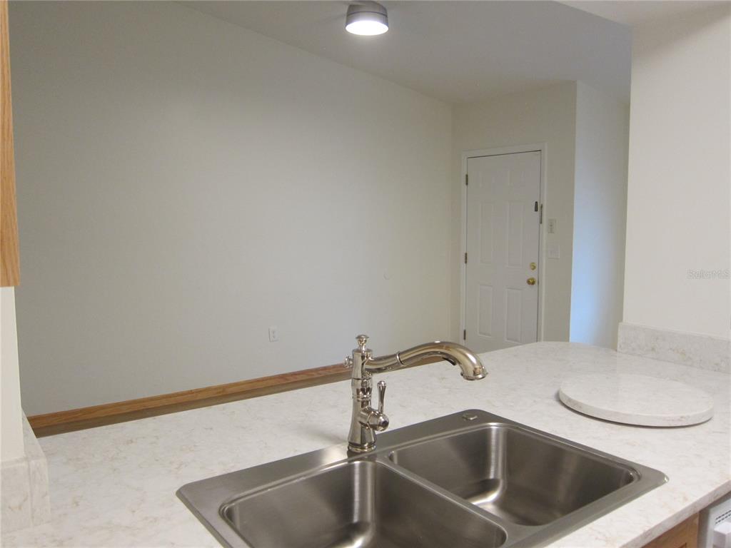 7023 Southwest 21st Lane Gainesville, FL 32607 - Photo 9 of 27 a close view of sink and tap