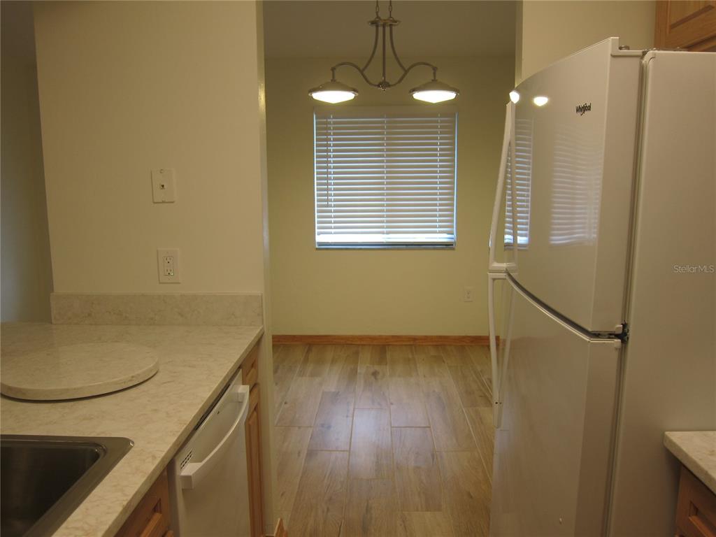 7023 Southwest 21st Lane Gainesville, FL 32607 - Photo 10 of 27 a view of an empty room with a window