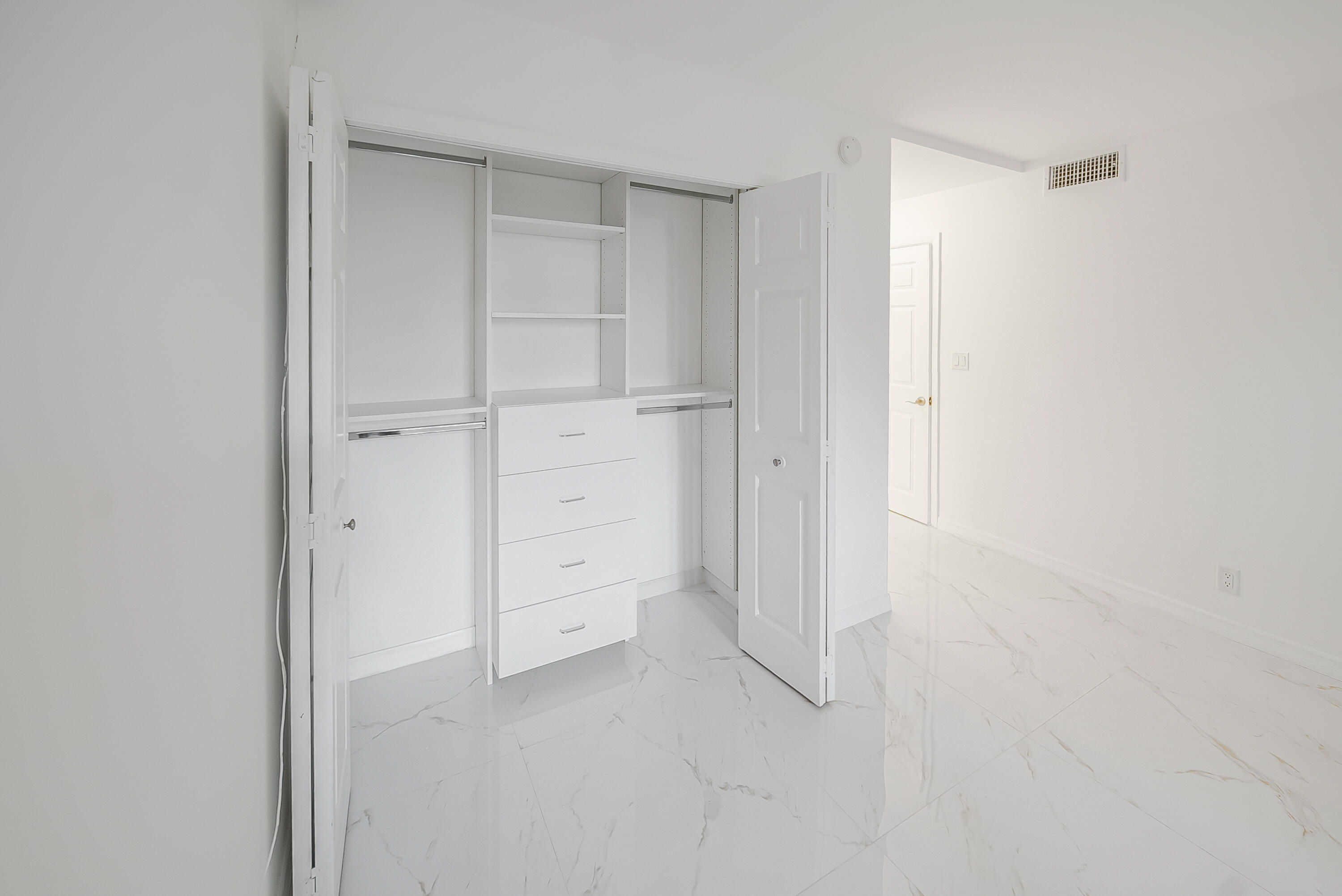 16300 Golf Club Road, Unit 114 Weston, FL 33326 - Photo 13 of 25 Master Bedroom Closet