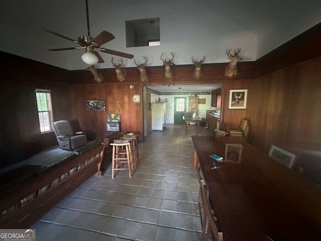 0 Old Poor Robin Road Sylvania, GA 30467 - Photo 20 of 25 a living room with lots of furniture and a chandelier