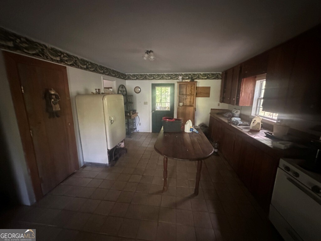 0 Old Poor Robin Road Sylvania, GA 30467 - Photo 22 of 25 a living room with furniture and a window