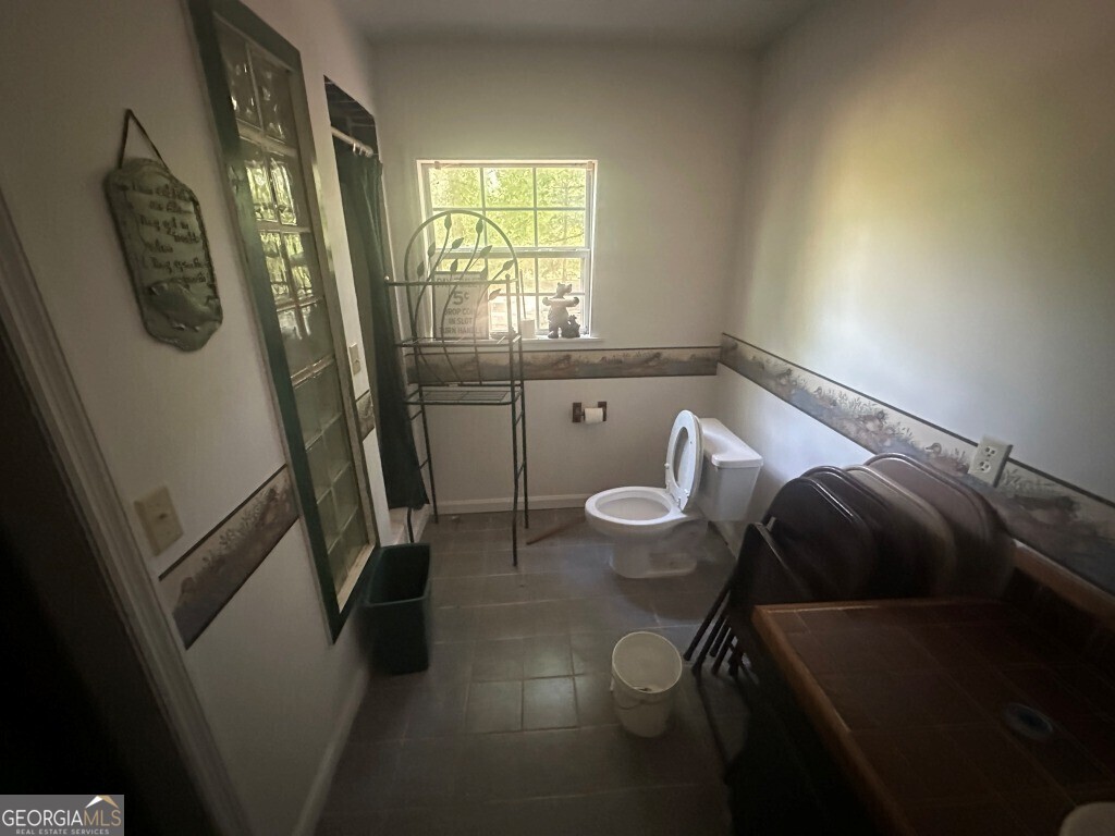 0 Old Poor Robin Road Sylvania, GA 30467 - Photo 23 of 25 a living room with furniture and a window