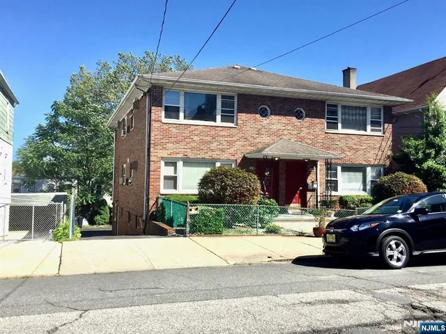 a view of a house with a patio