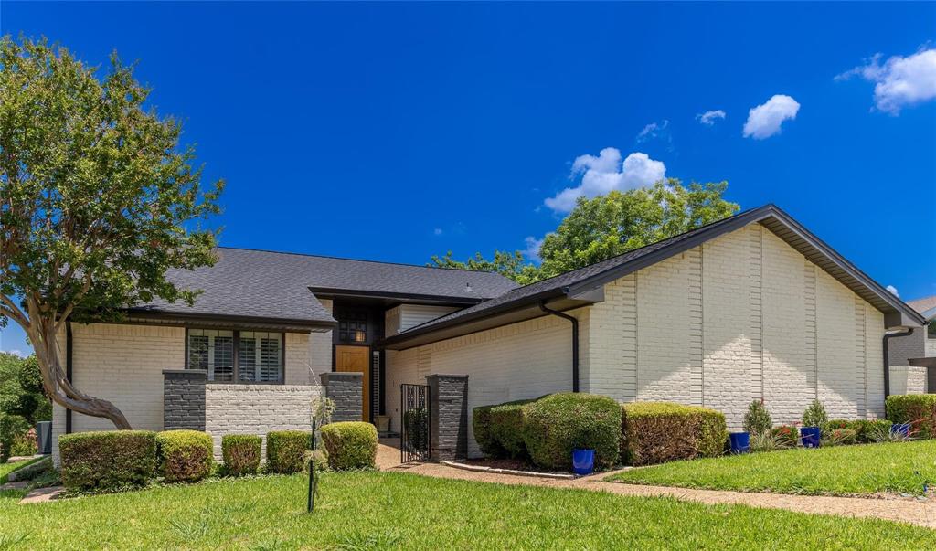 224 Sovereign Court Rockwall, TX 75032 - Photo 1 of 16 a view of a house with a yard