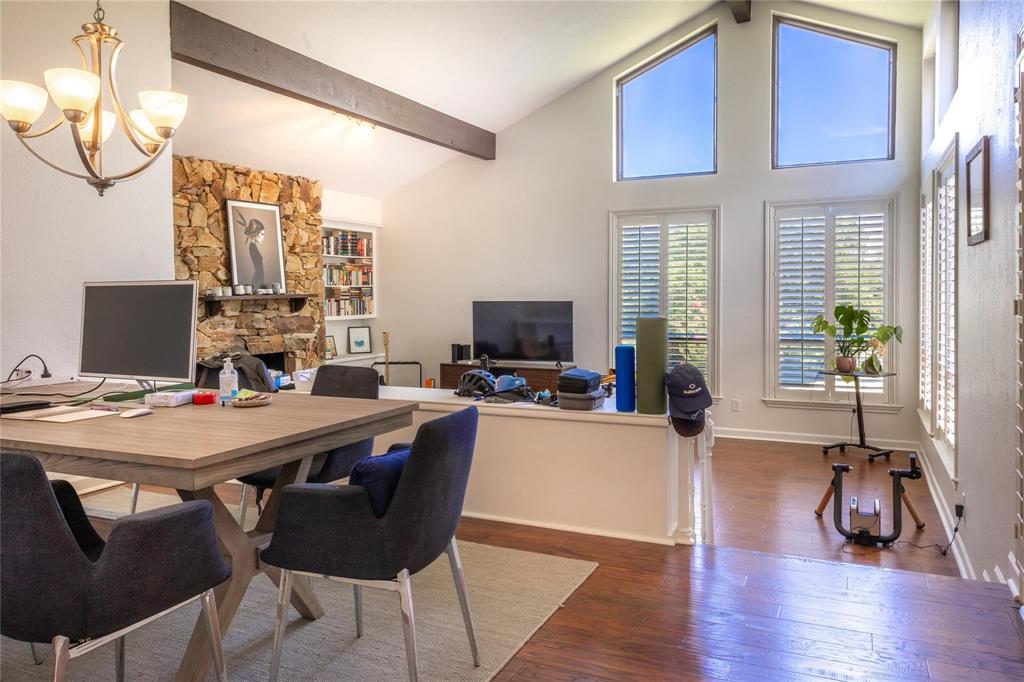 224 Sovereign Court Rockwall, TX 75032 - Photo 5 of 16 a view of a dining room with furniture window and wooden floor