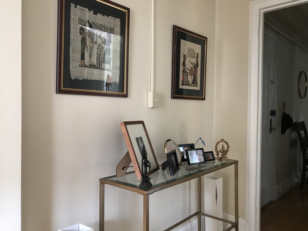 1450 Beacon Street, Unit 342 Brookline, MA 02446 - Photo 11 of 16 a view of a hallway with workspace
