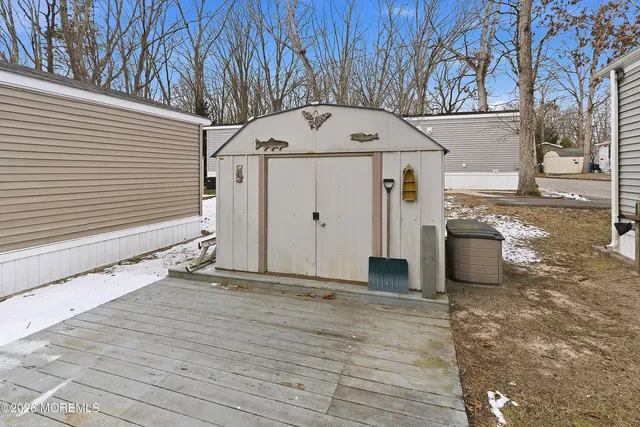 a view of a room with wooden fence