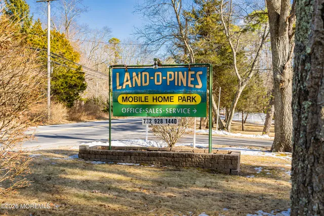 a sign on the side of a street