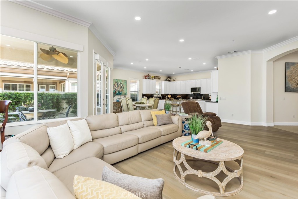 5233 Hampton Road Banning, CA 92220 - Photo 10 of 46 a living room with furniture kitchen view and a large window
