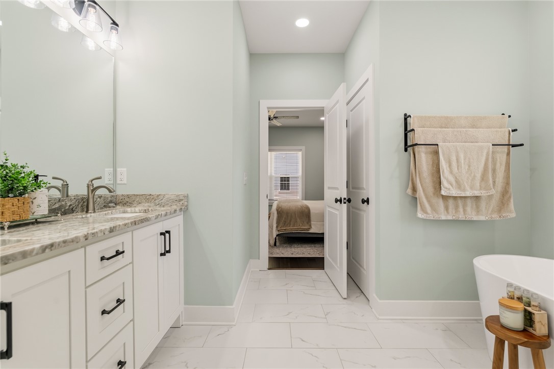 502 Canebrake Drive Anderson, SC 29621 - Photo 23 of 39 This serene bathroom offers a bright and airy atmosphere, ideal for daily routines.