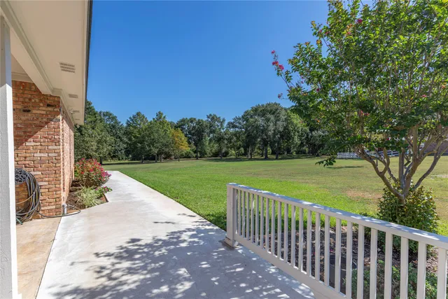 a view of a garden and basketball court
