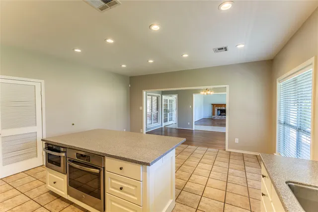 a view of kitchen with windows