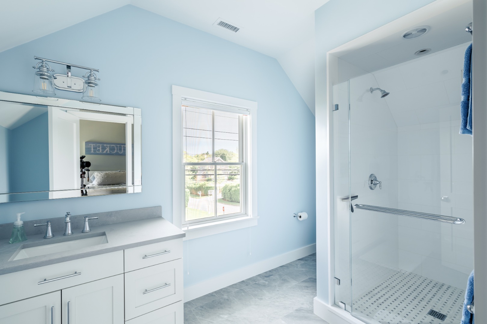 86 Cliff Road Nantucket, MA 02554 - Photo 19 of 29 a bathroom with a shower sink and mirror