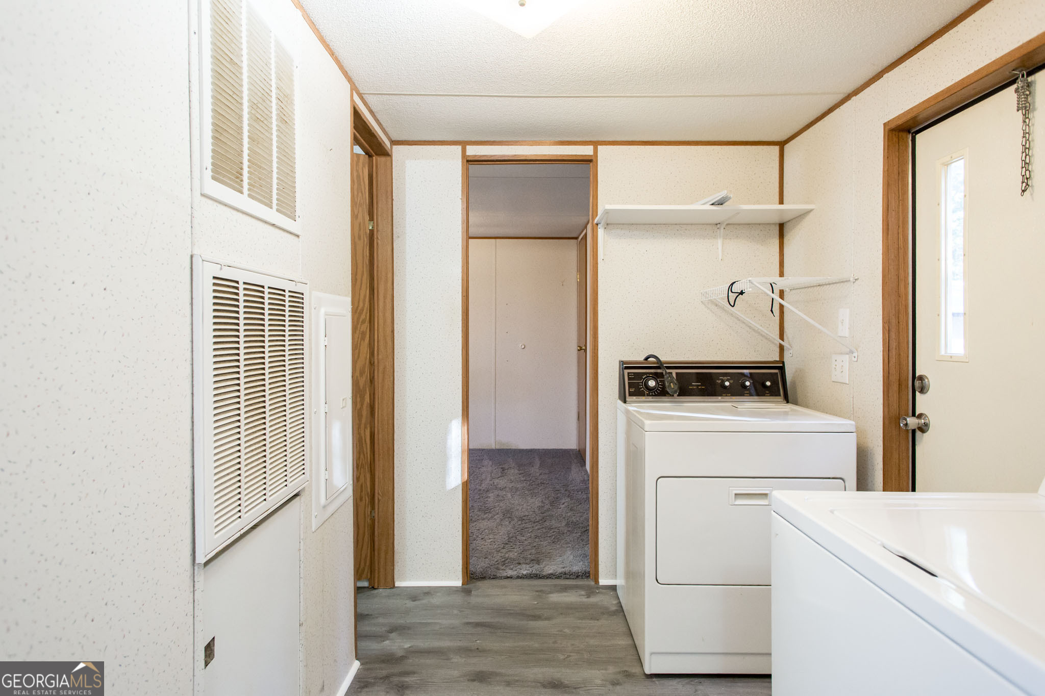 6005 Chancey Road Patterson, GA 31557 - Photo 13 of 23 a room with storage and utility