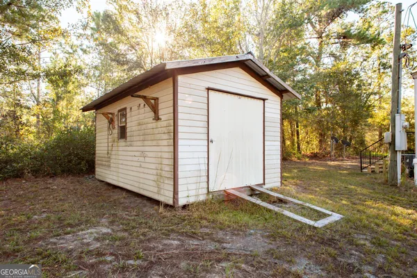 a view of backyard of house