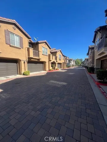 a view of a garden with an tree