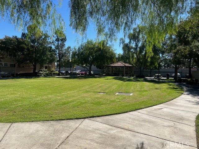 10375 Church Street, Unit 106 Rancho Cucamonga, CA 91730 - Photo 26 of 26 a swimming pool with outdoor seating and yard