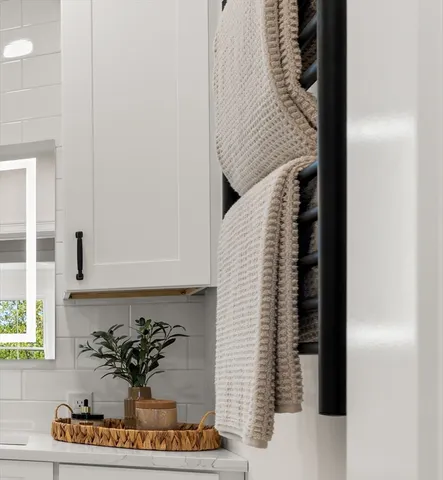 a bedroom with a bed a couch and a window