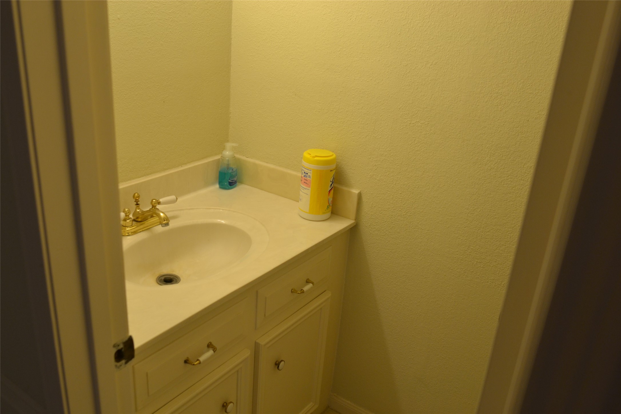 1223 Longledge Drive Seabrook, TX 77586 - Photo 14 of 49 a bathroom with a sink and mirror