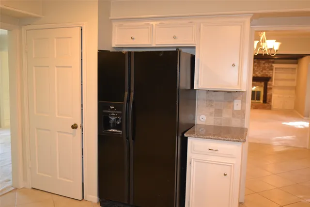 a bathroom with a sink vanity and mirror