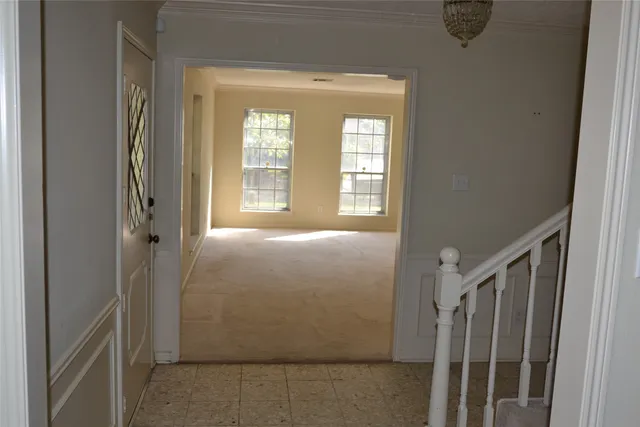 a balcony with wooden floor
