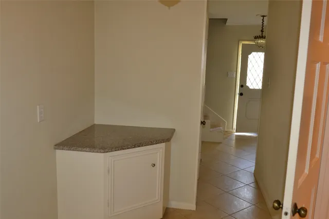 a view of outdoor space with wooden fence