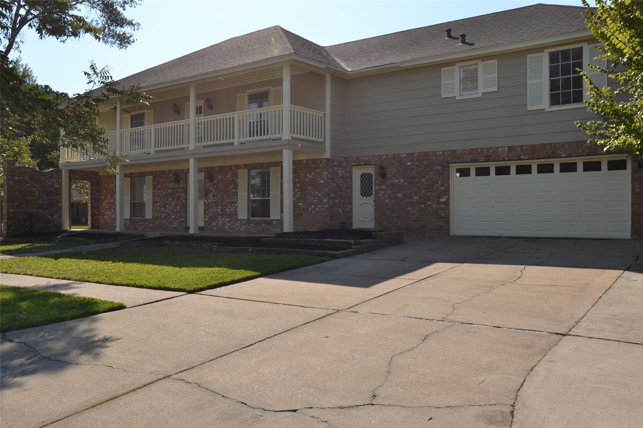 1223 Longledge Drive Seabrook, TX 77586 - Photo 5 of 49 a front view of a house with a yard