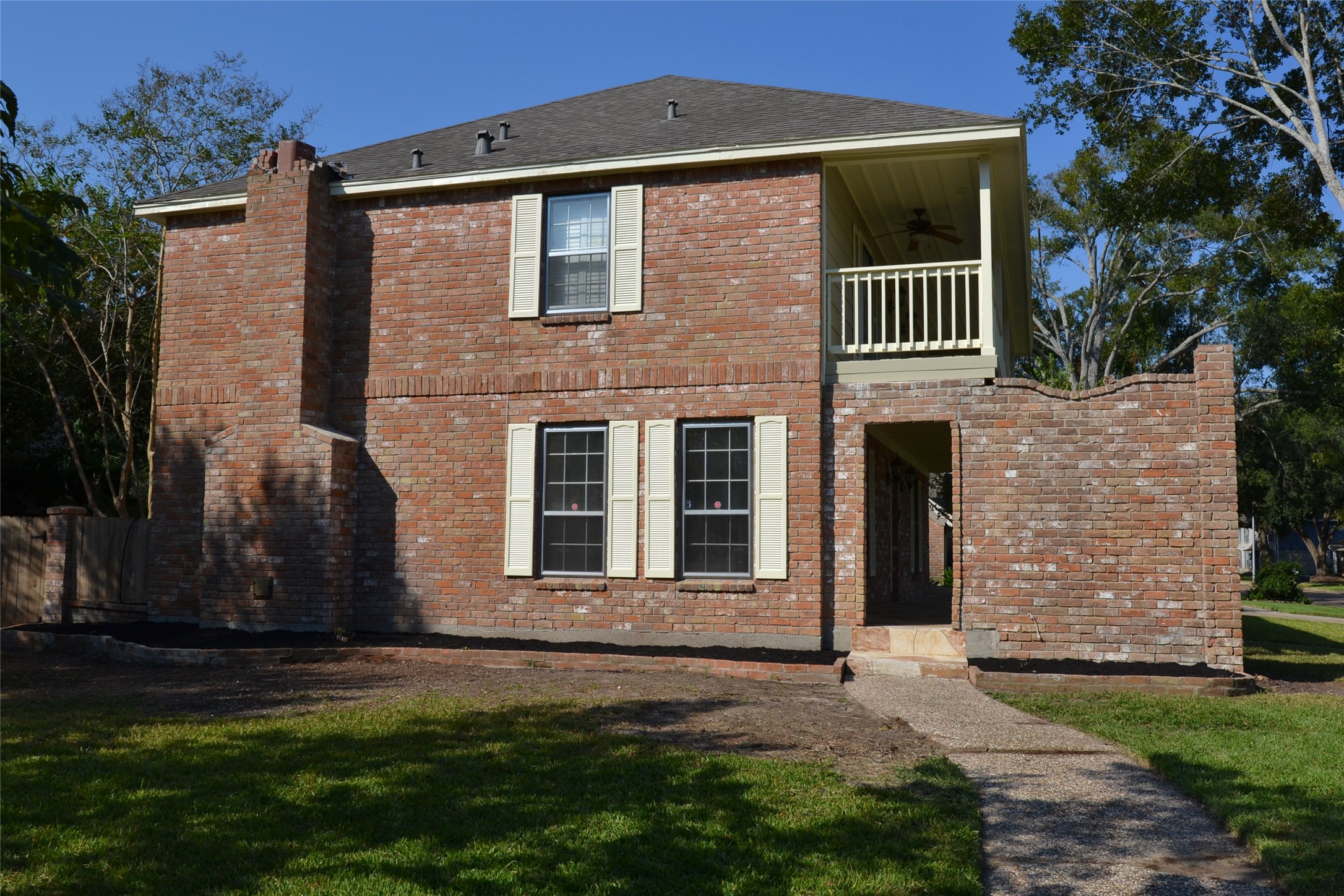1223 Longledge Drive Seabrook, TX 77586 - Photo 7 of 49 a front view of a house with a garden