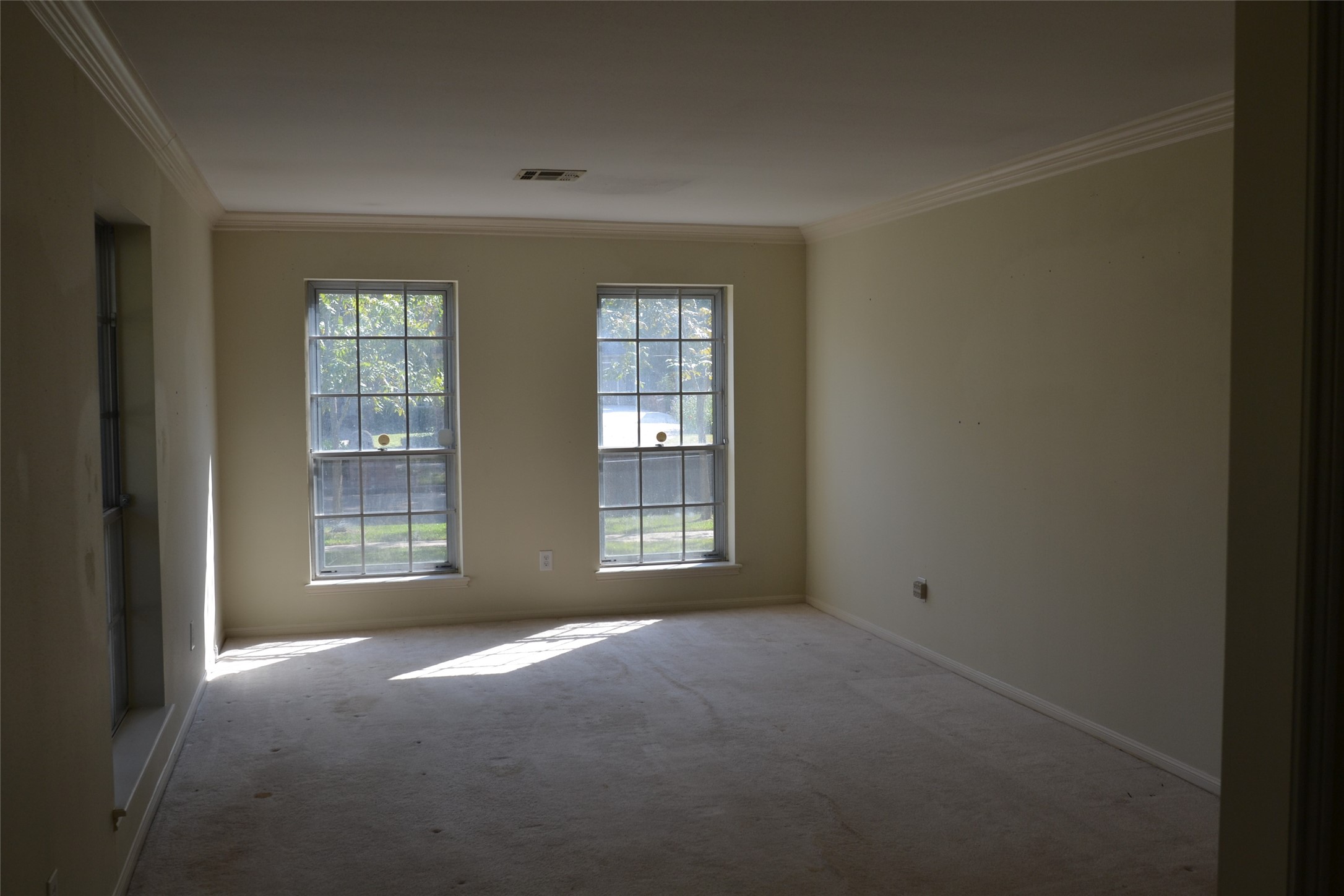 1223 Longledge Drive Seabrook, TX 77586 - Photo 8 of 49 a view of an empty room with a window