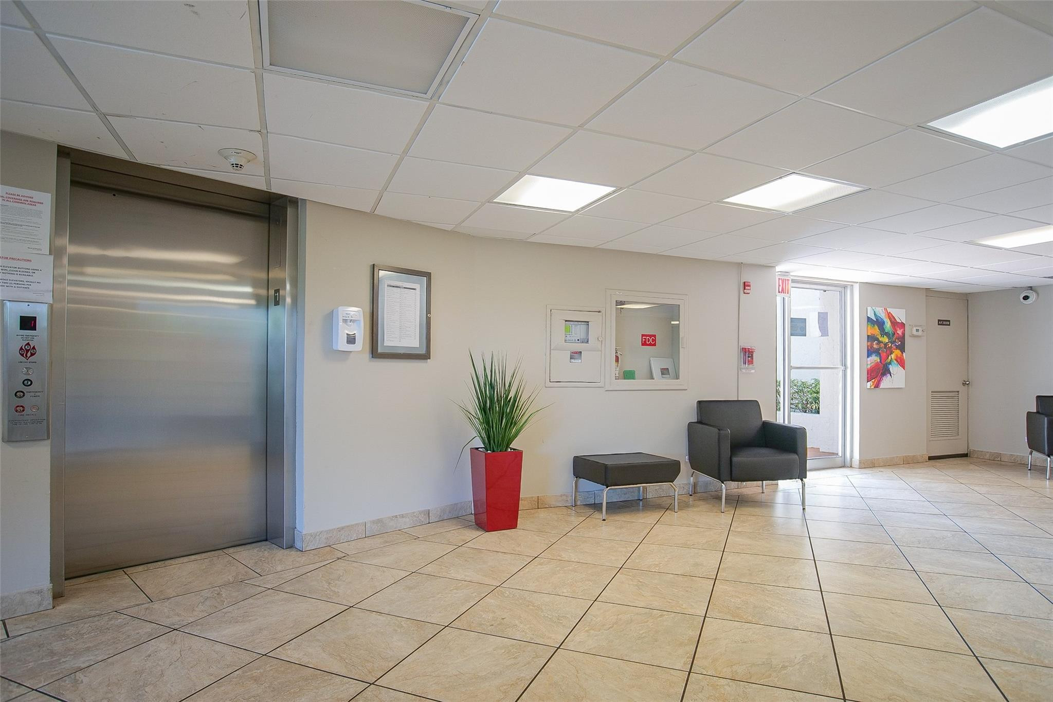3930 Inverrary Boulevard, Unit 608D Lauderhill, FL 33319 - Photo 42 of 65 a living room with furniture