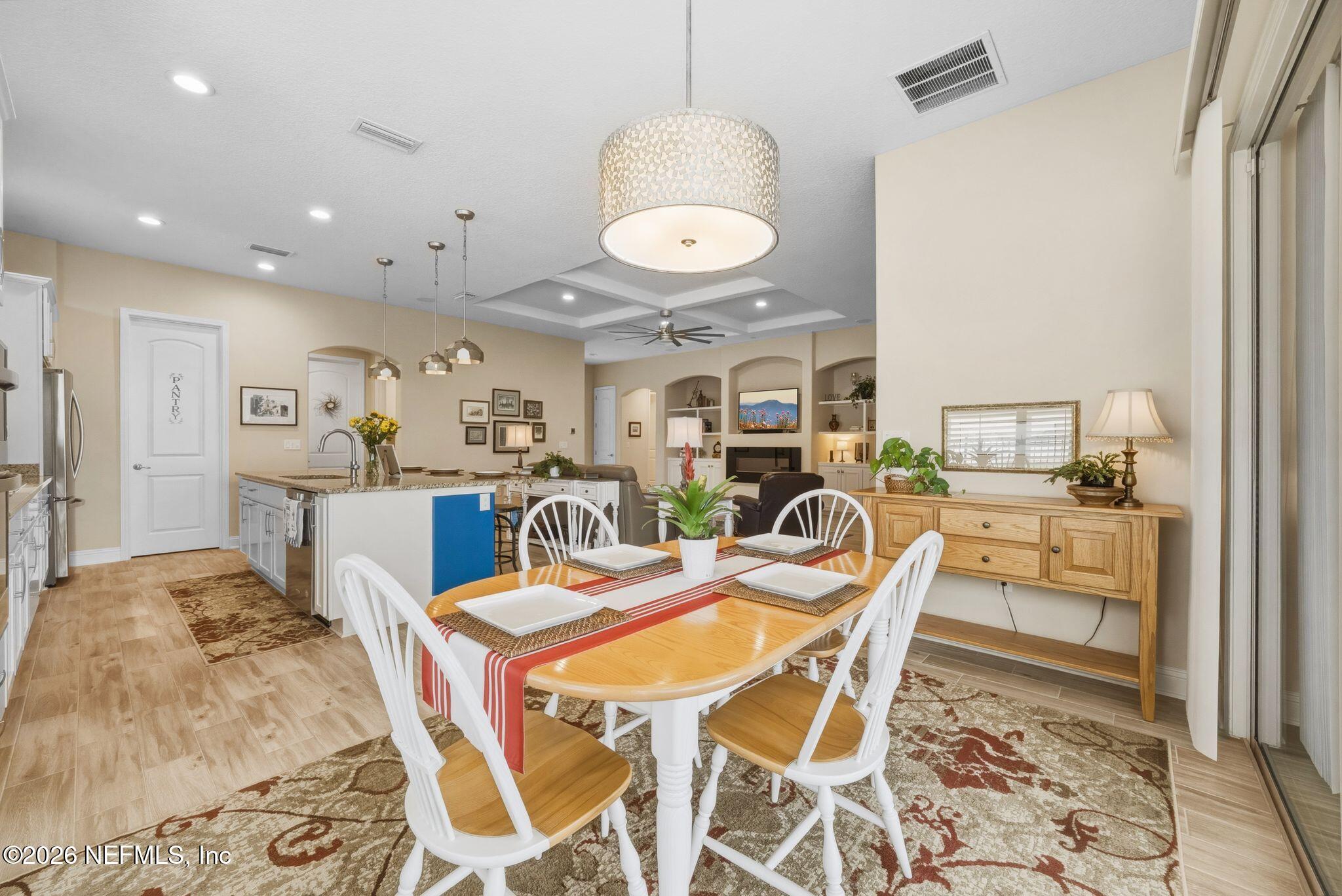 334 Athens Drive St. Augustine, FL 32092 - Photo 11 of 57 a view of a dining room with furniture